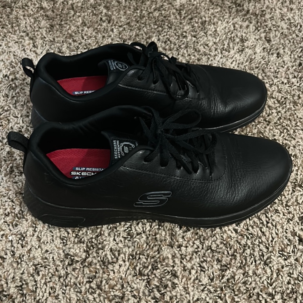 All black Skechers slip resistant sneaker